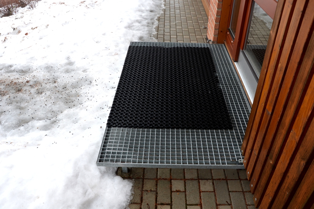 Entry Mat outside Building in Winter